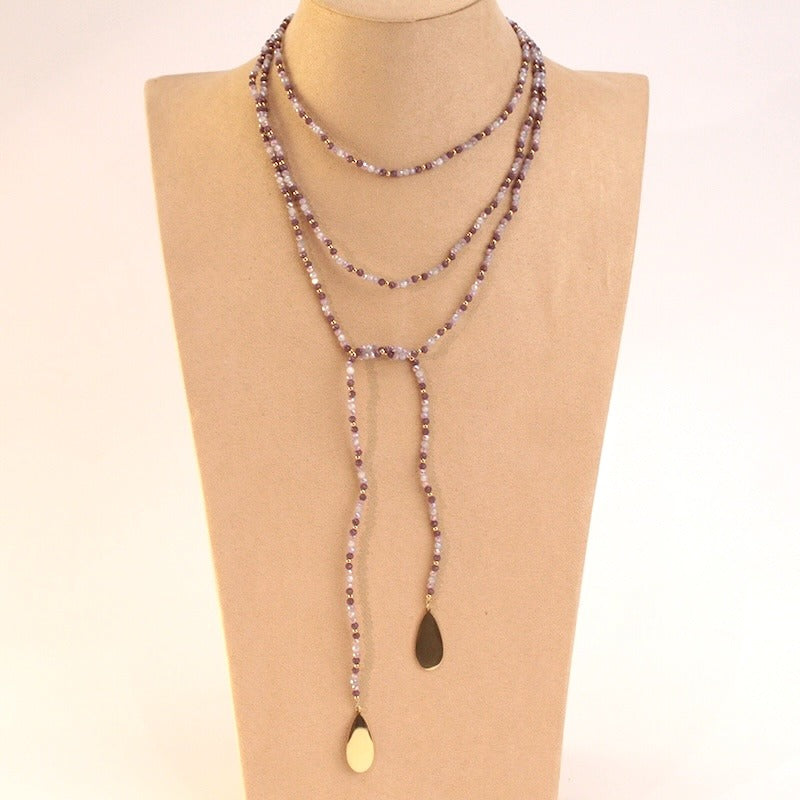 Collar acero bolitas morado