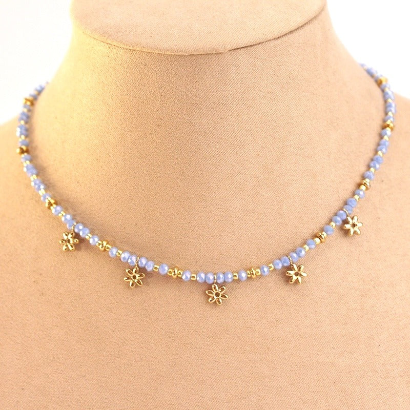 Collar acero bolitas y flores lila