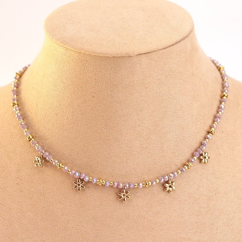 Collar acero bolitas y flores lila