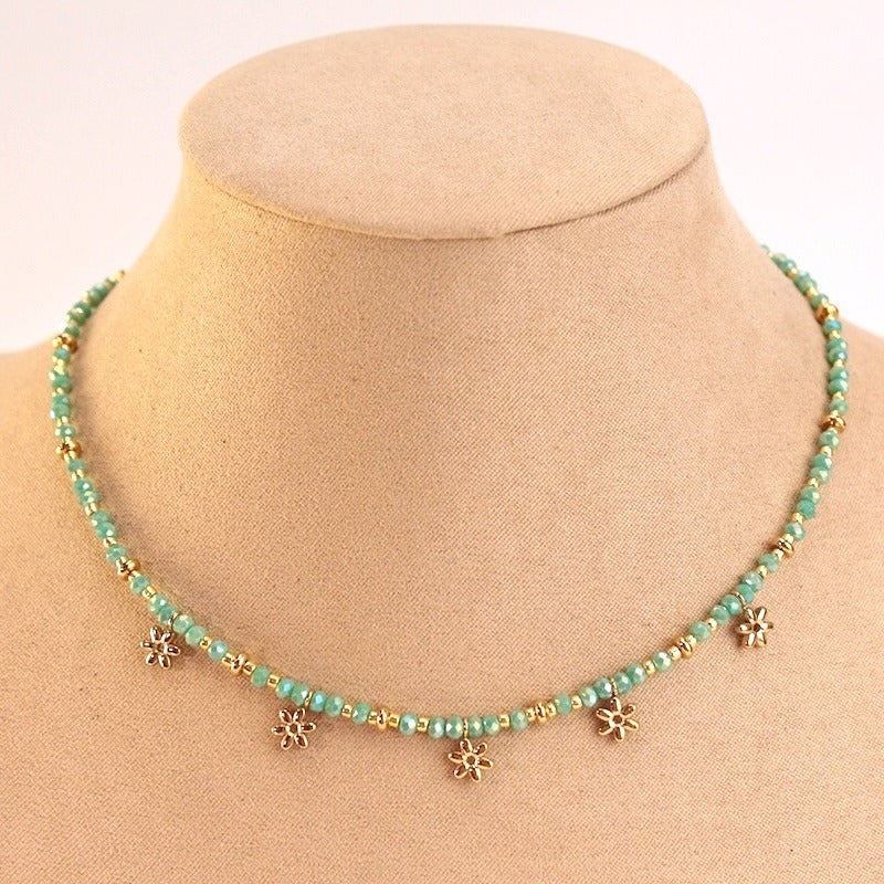 Collar acero bolitas y flores lila